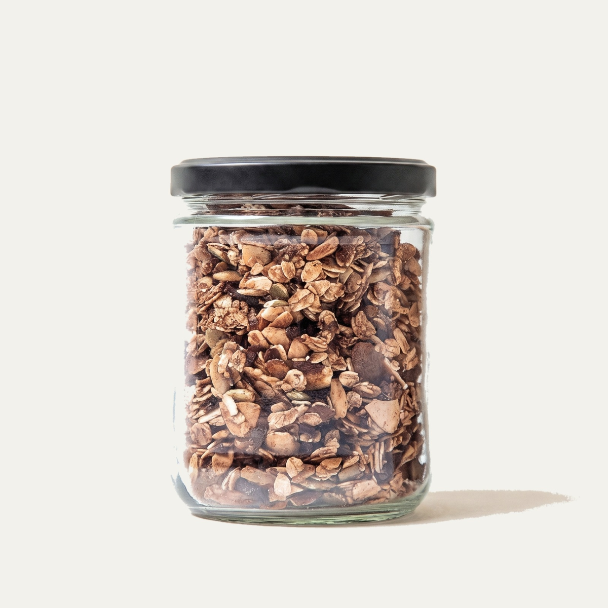 Ashwagandha chai-spiced granola jar, filled from the real product photo